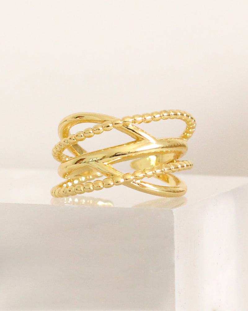 Anillo entrelazado liso bolitas
