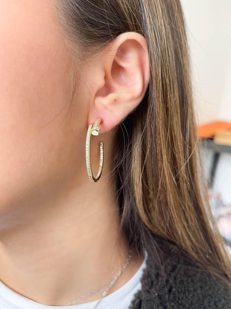 Aretes de clavo con zirconias Pink Revolver