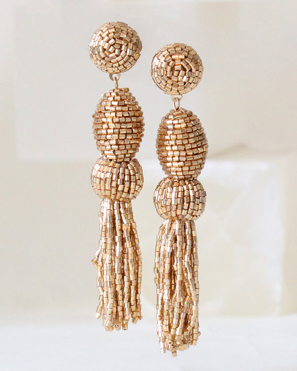 Aretes Dorados Pompom Chakira