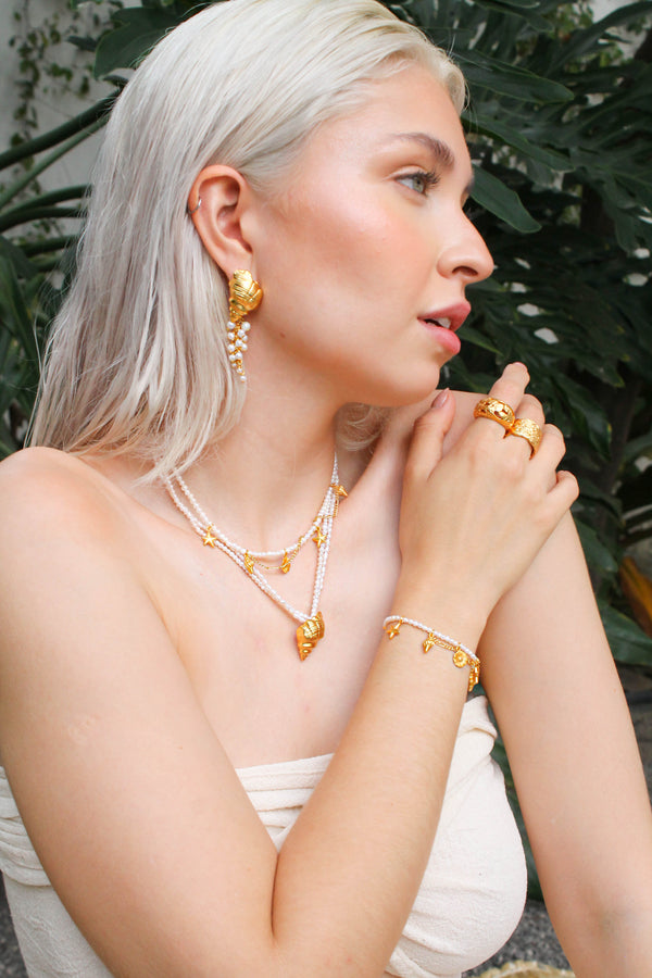 Aretes Caracol cascada perlas